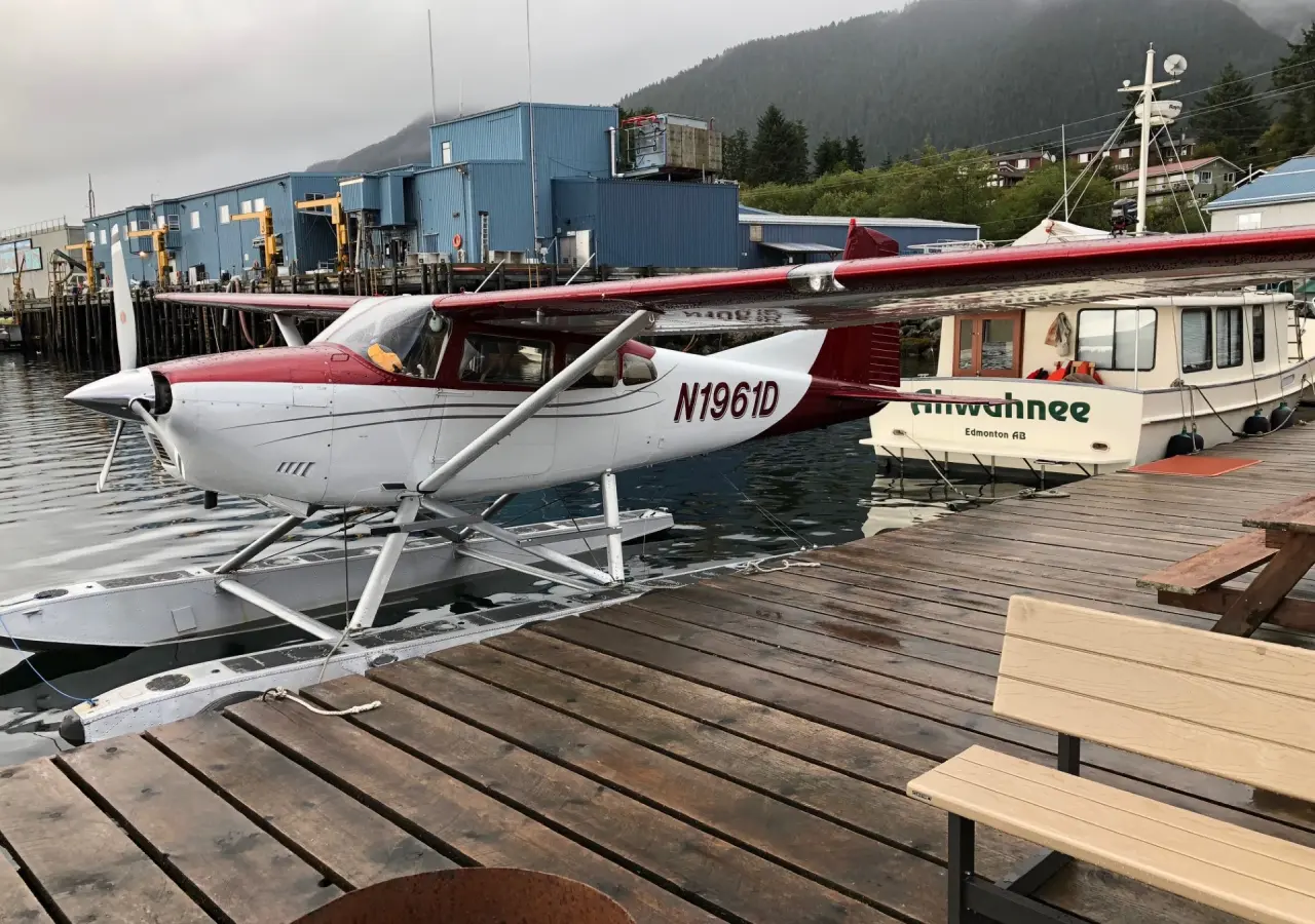 A small plane sitting on top of a dock.